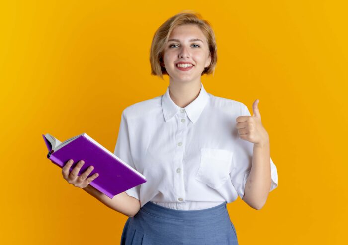 Blonde, female Russian teacher ready to teach the alphabet