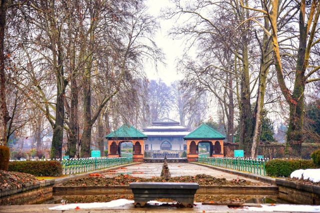 1. Shalimar Bagh garden in Srinagar during autumn, with colourful foliage and traditional Kashmiri landscaping.